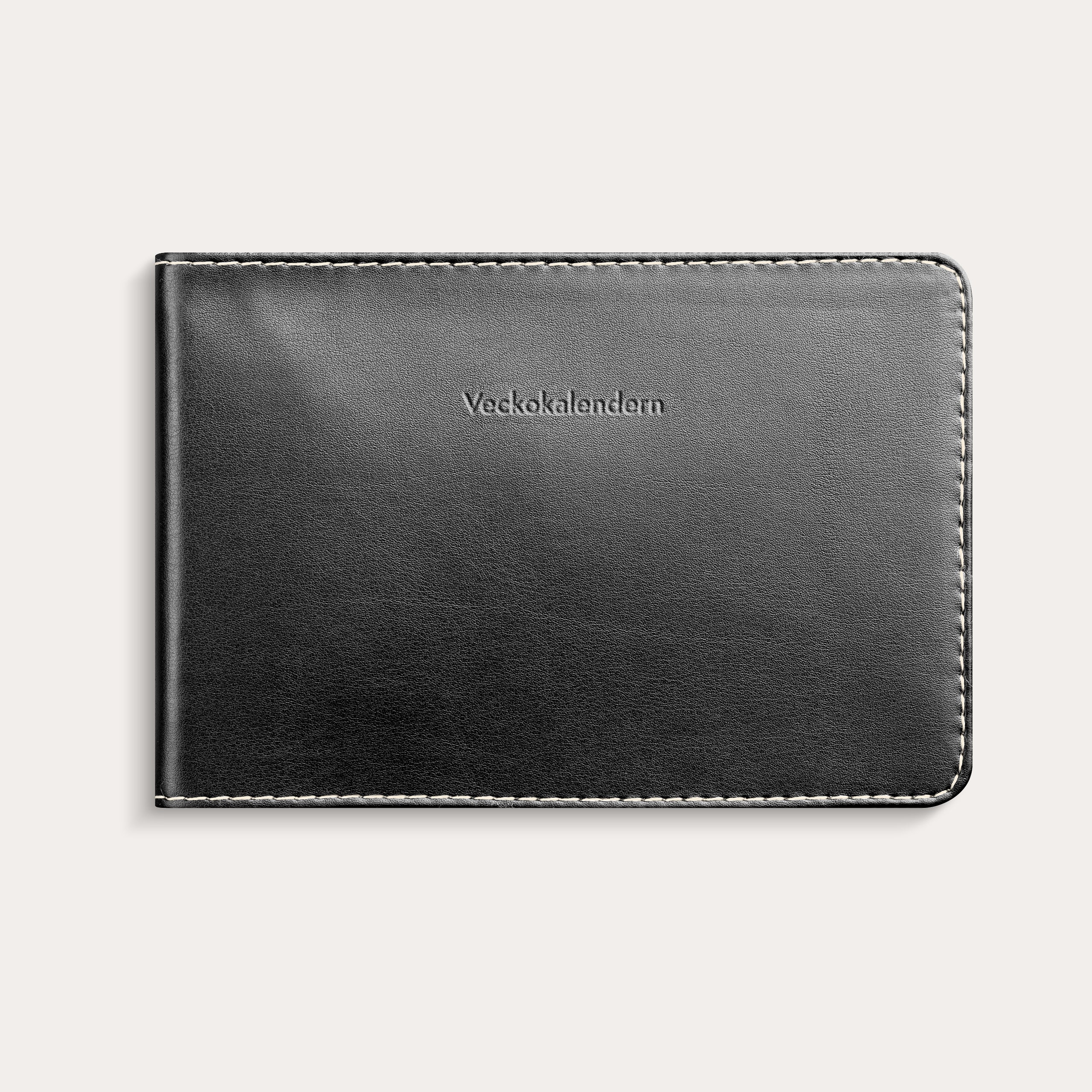 Veckokalendern 2026 svart konstläder